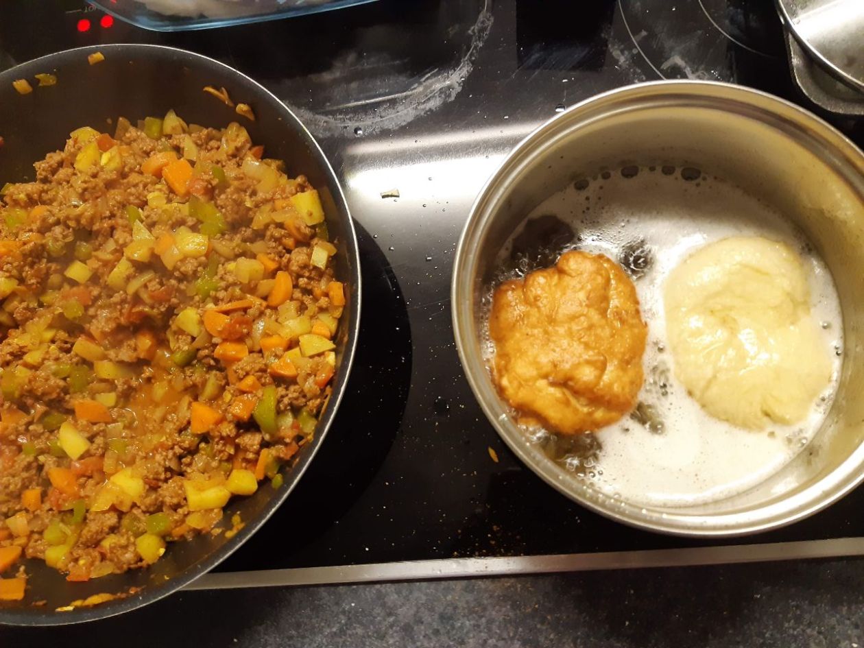 curry mince and vetkoek cooking
